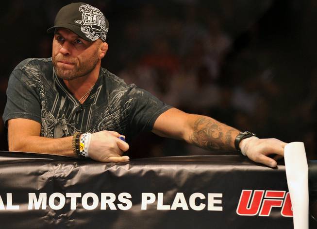 UFC legend Randy Couture stands in the corner of one his teammates during a fight at UFC 115 in Vancouver, British Columbia on June 12, 2010.